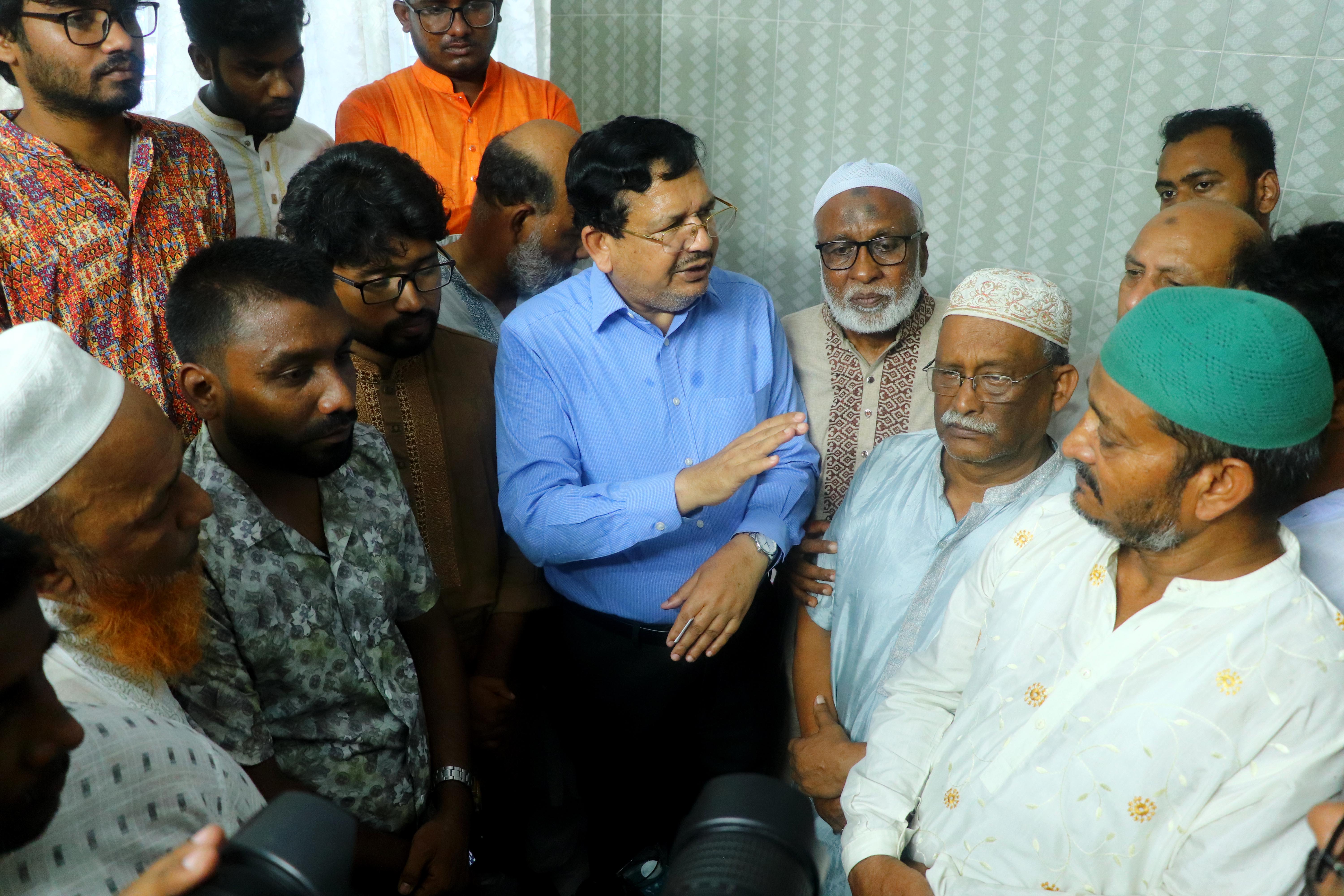 financial support of Shimul Biswas to the families of two students killed in Pabna